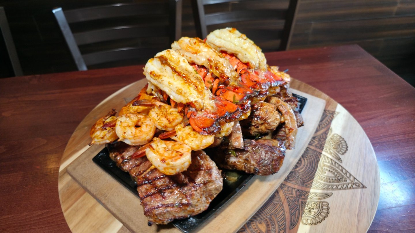 Grilled steak and seafood platter